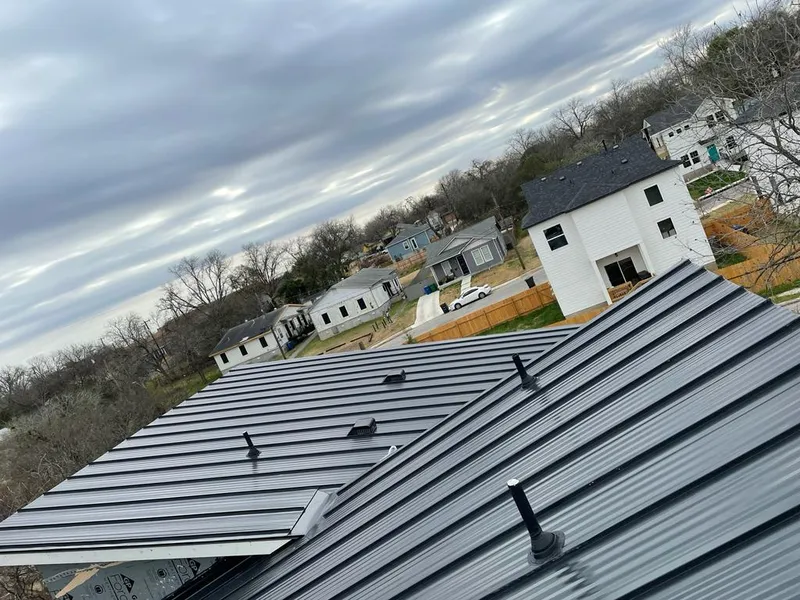 Standing seam metal roof panels with vents for Skylight Repair in Machesney Park